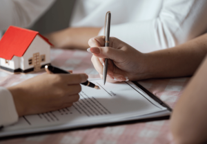 signing home contract with real estate lawyer in london ontario real estate law 
